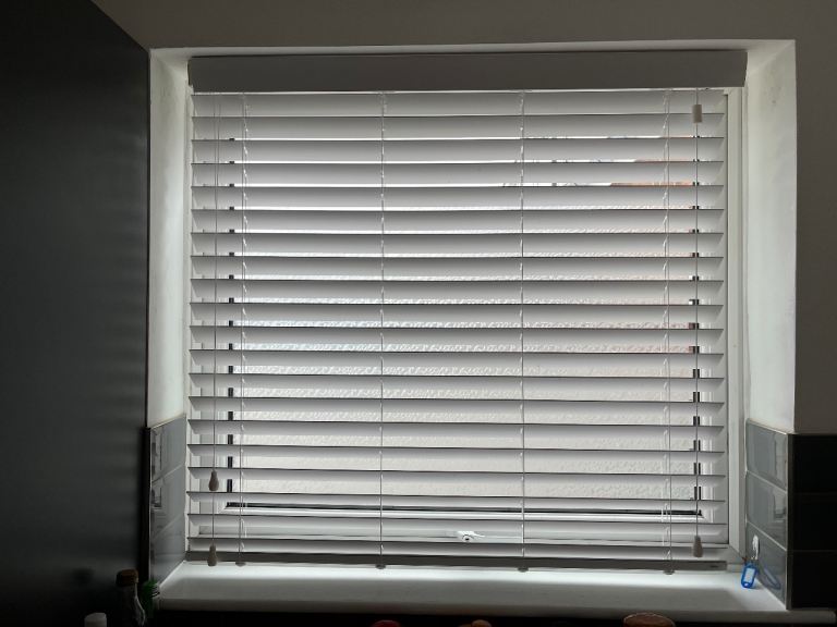 White faux wood kitchen blinds