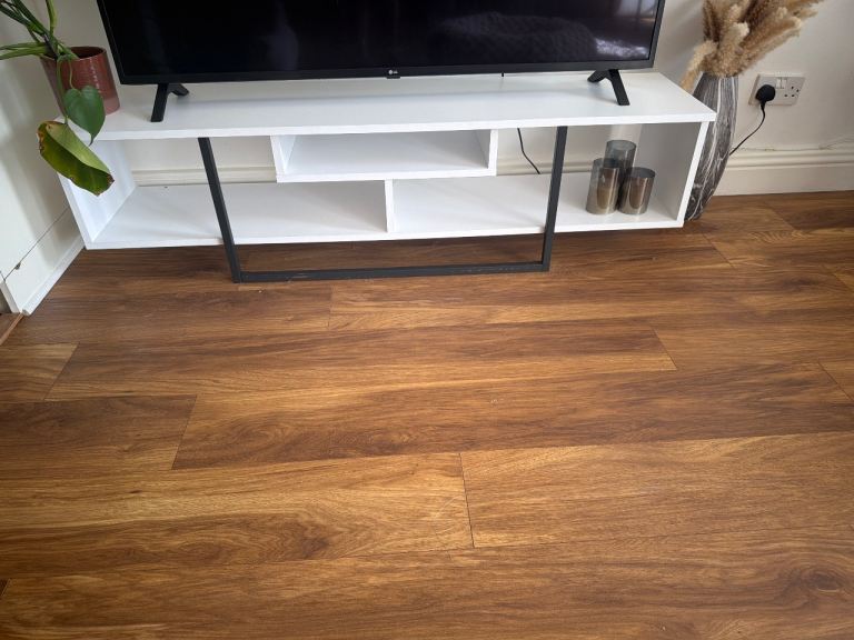 Tv stand with black metal  legs 