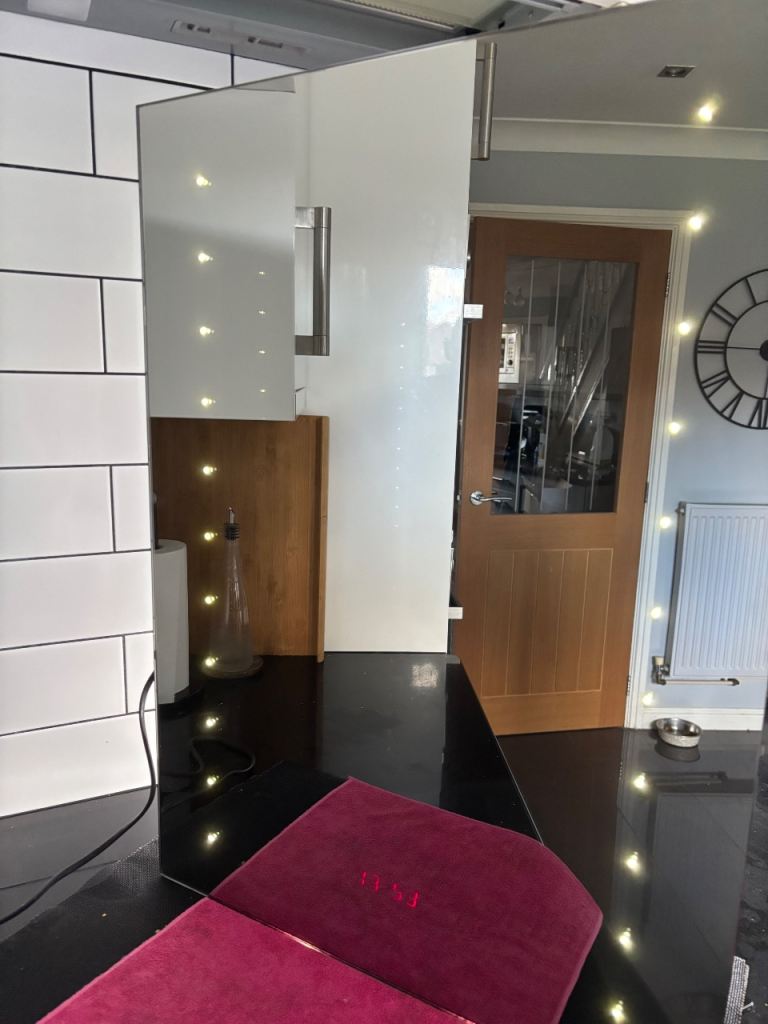 Illuminated bathroom mirror with anti fogging feature. 