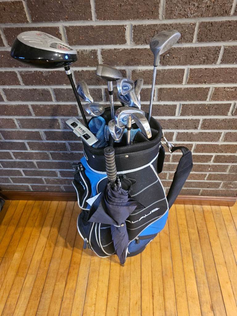 Two sets of Golfing equipment. 
