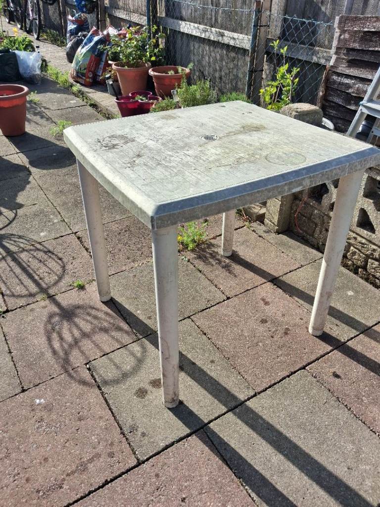 Plastic garden table used for potting 