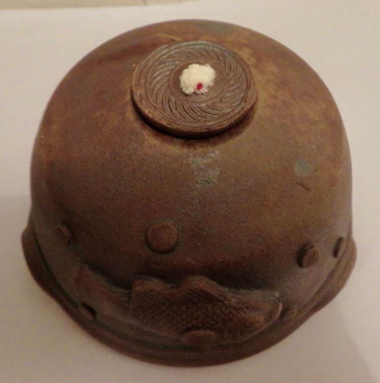 Handmade ceramic oil lamp with fun fish design