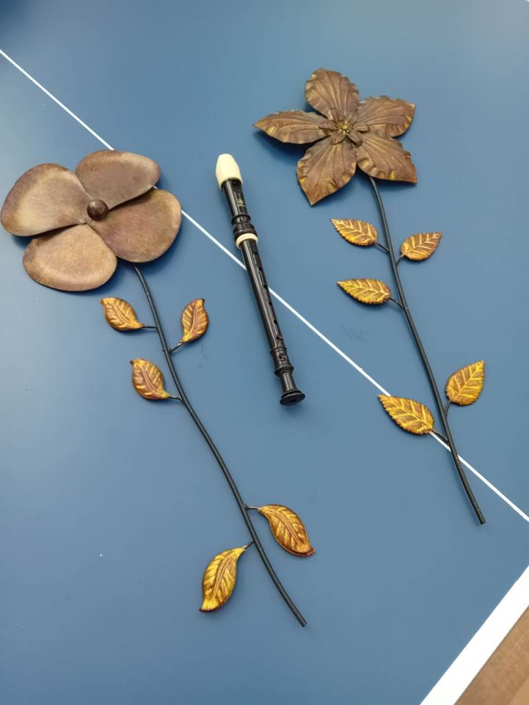 Recorder and metal wall art