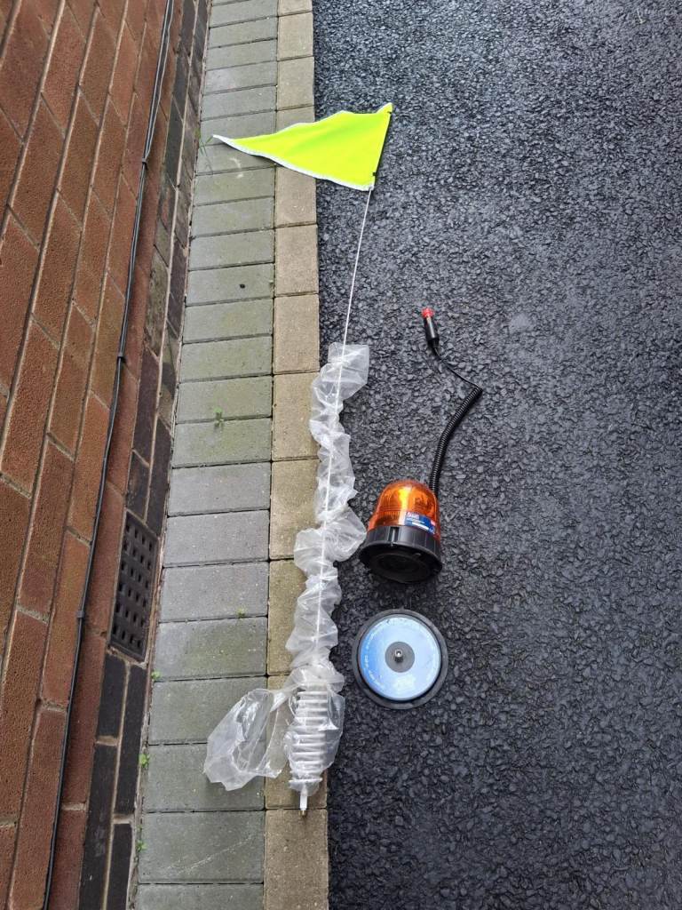 5ft magnetic vehicle safety flag and rotating warning beacon.