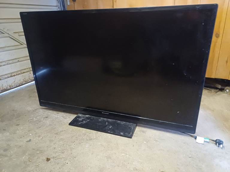 60" tv with remote and stand 