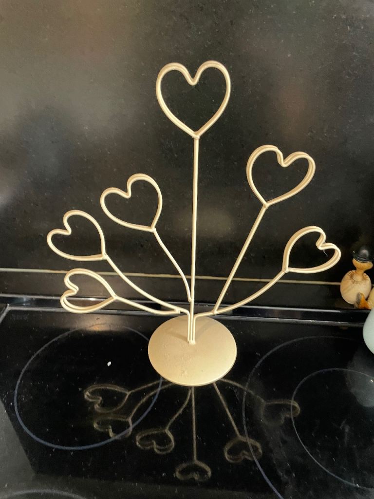 Photo, card or letter holder.