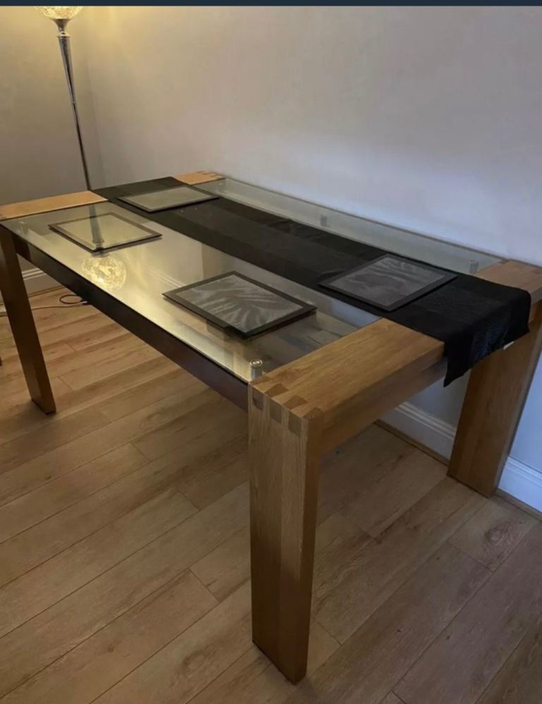 Solid oak and glass dining table 