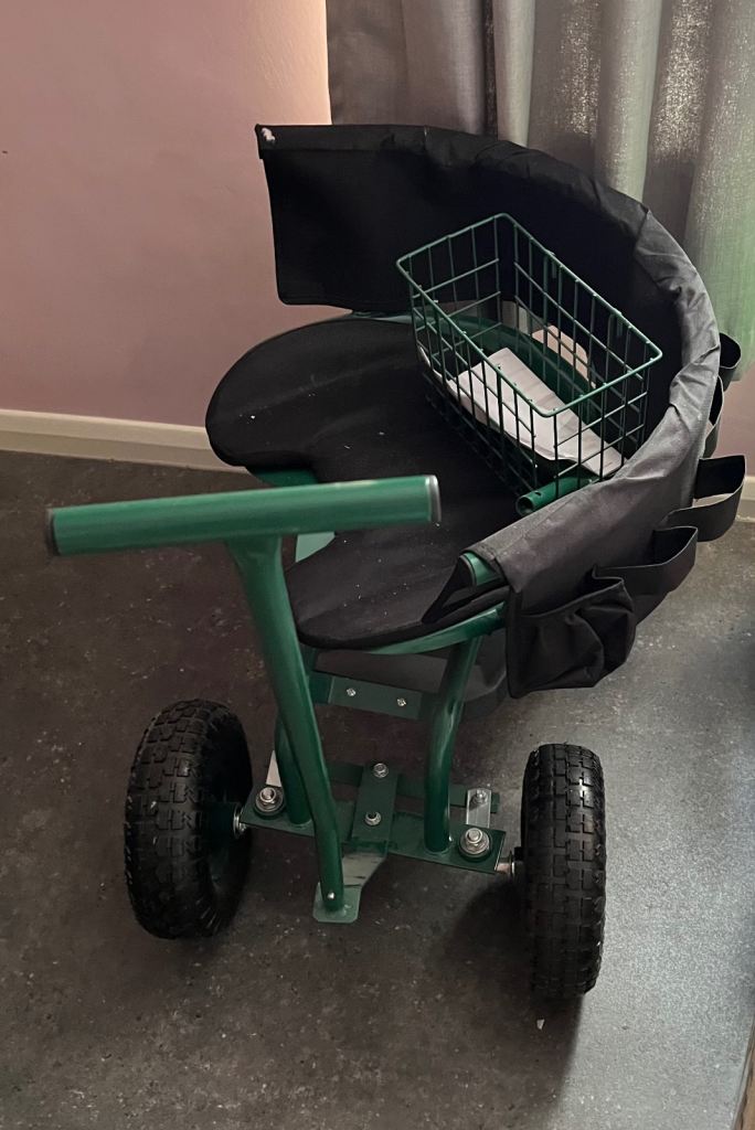 Rolling garden cart with seat