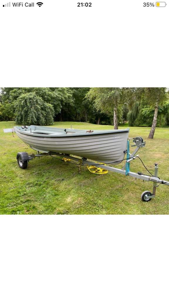 15ft Clinker style boat + Trailer + 4hp Outboard Motor