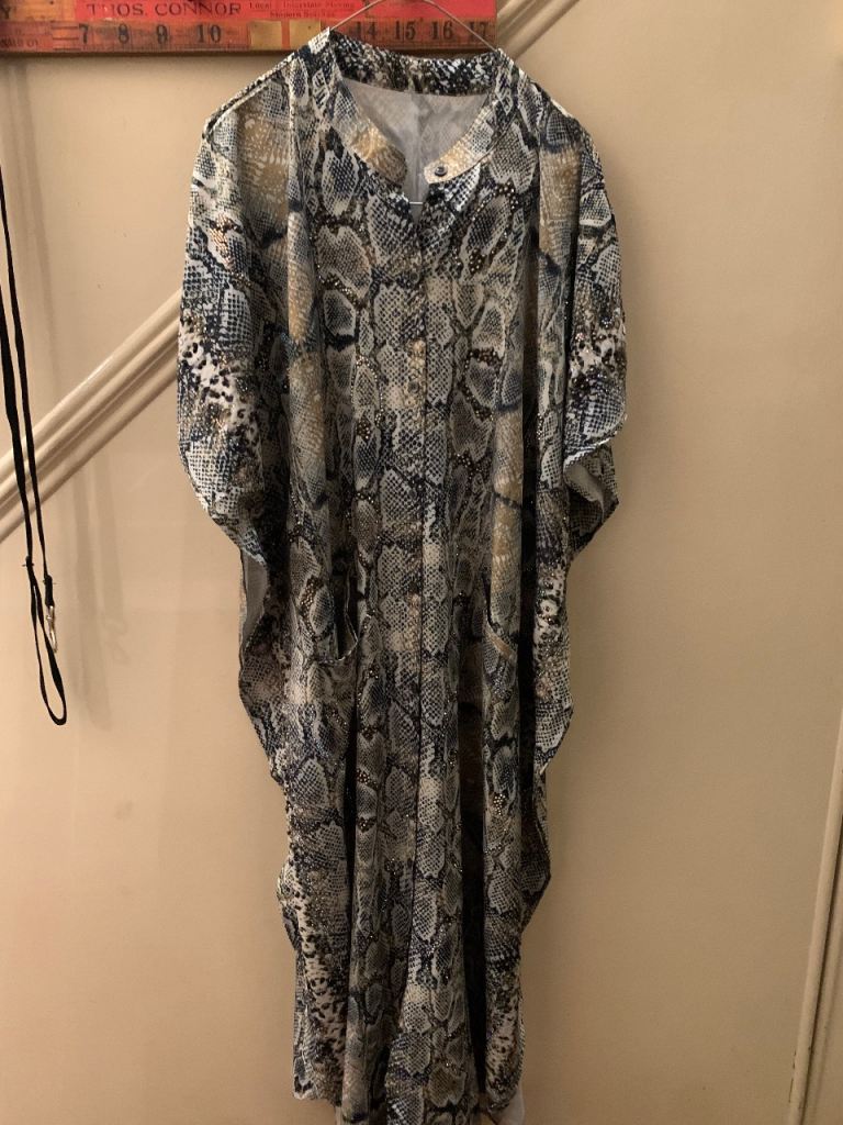 Kaftan with snakeskin print and rhinestones