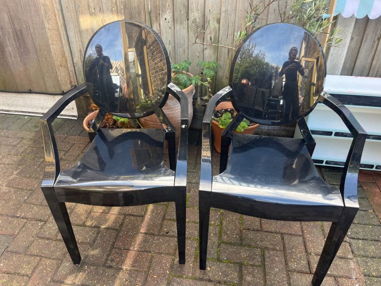 Pair of Black Kartell Ghost chairs 