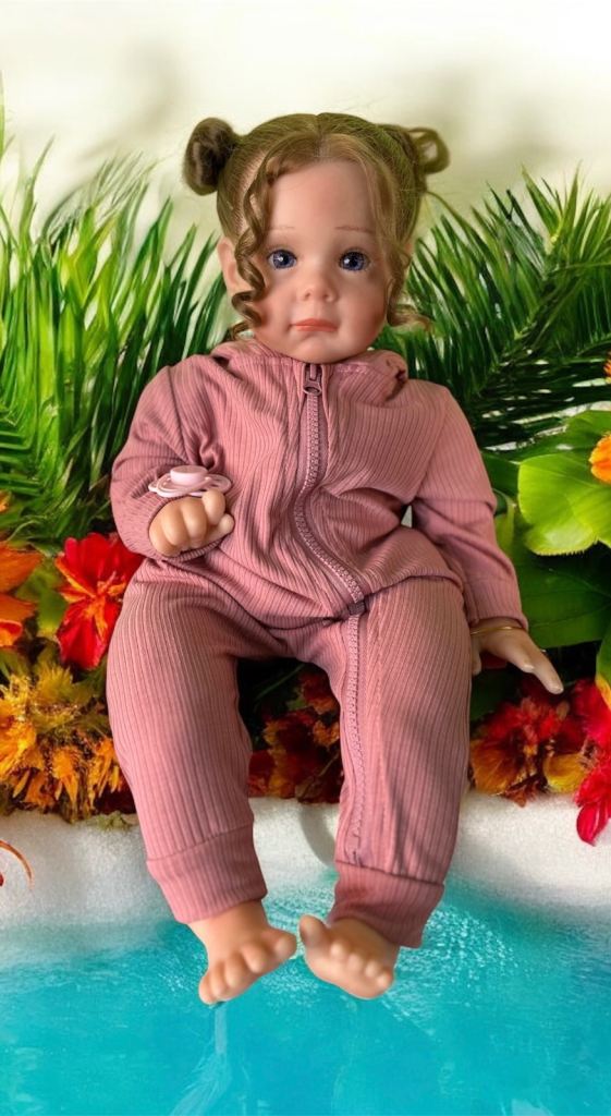 Lifelike Reborn Baby Doll in Pink Outfit 55cm– As Good As New
