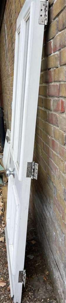 Double glazed front solid door white with locks, handle and hinges.