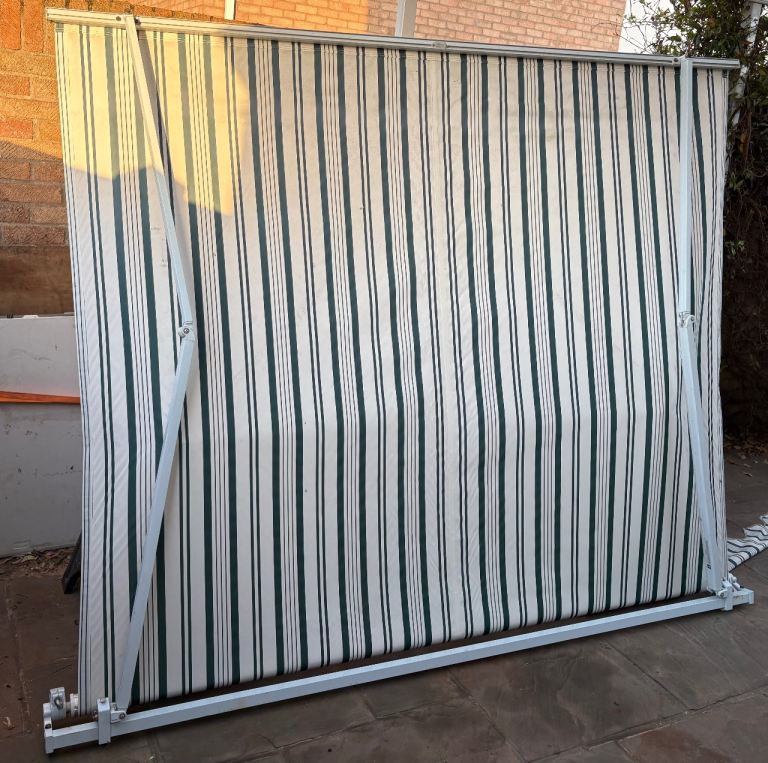 A good used 2.4M wide X 2.1M deep wind out awning 