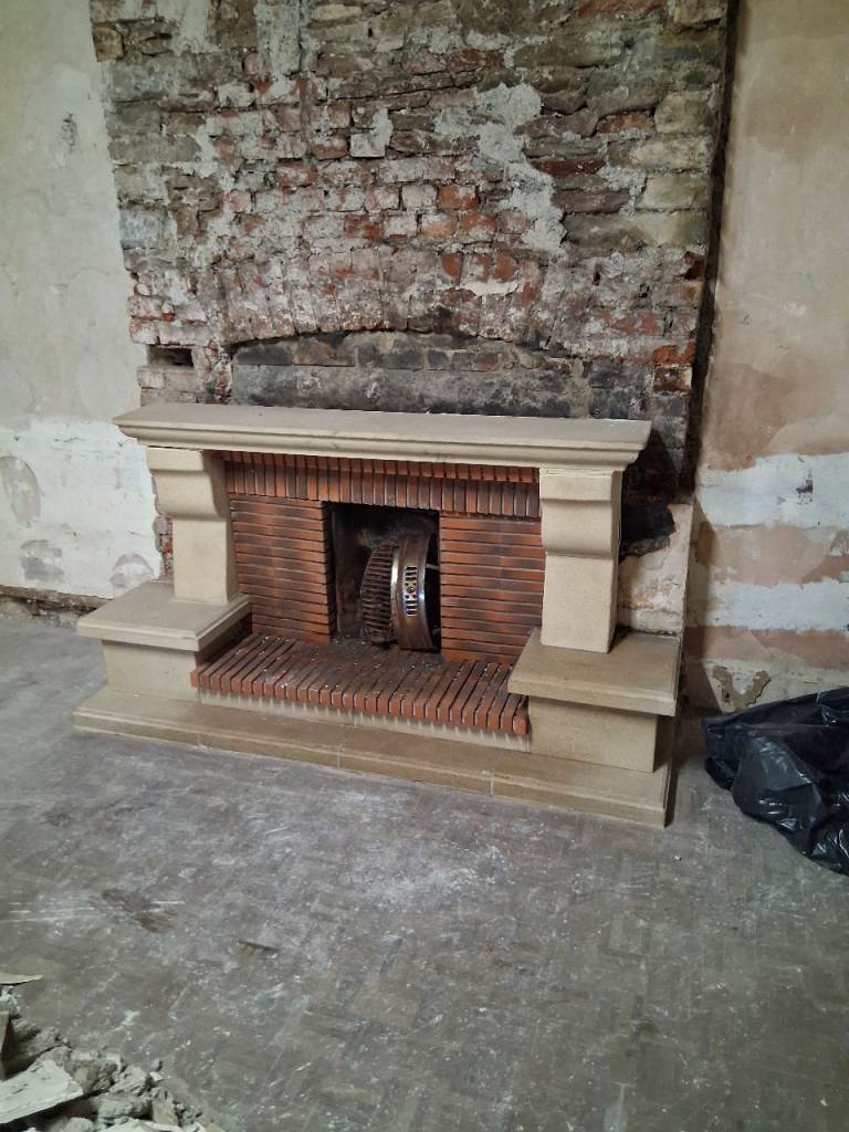 Crafted stone fire surround 