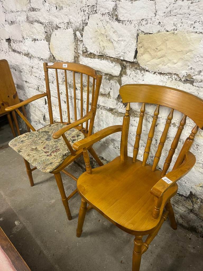 Wooden chairs with arms in good condition   £50 each 