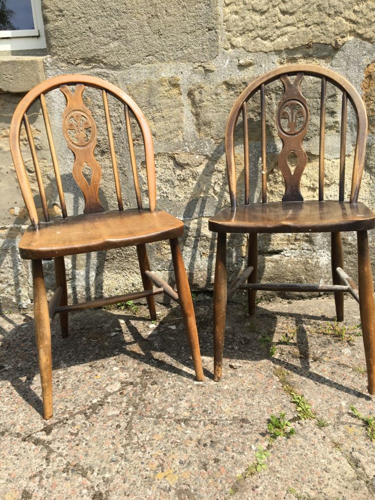 Ercol  “Fleur De Lys” chairs.