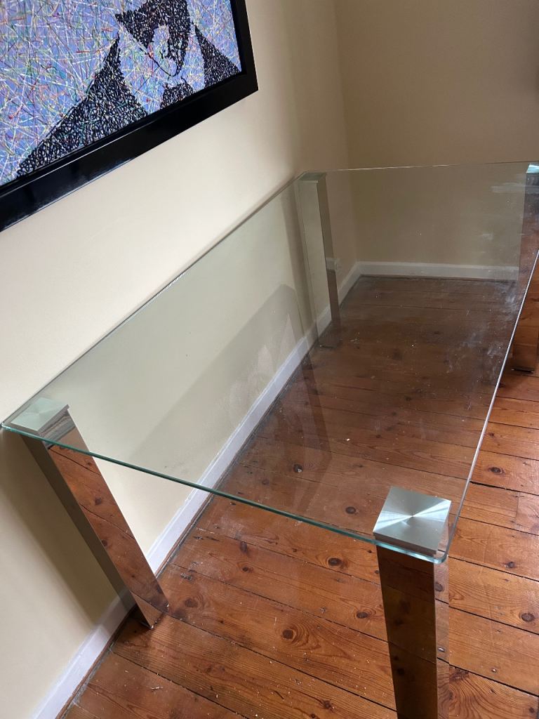 Glass and chrome dining table