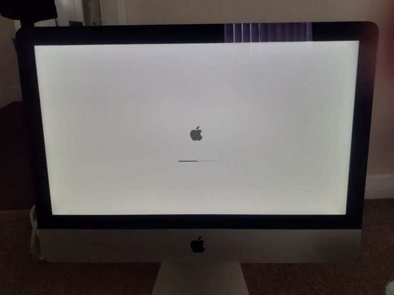 Apple monitor, wireless keyboards and wireless mouse