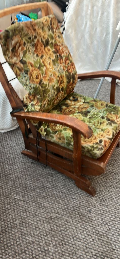 Vintage  tocking chair with floral covers