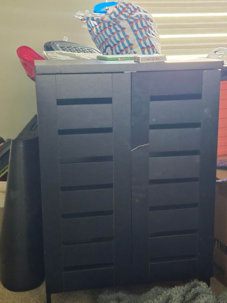 Black Wooden Storage Cabinet with Slatted Doors – Good Condition