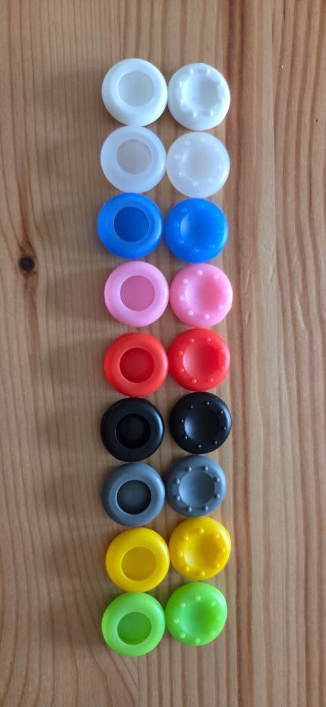 Silicone thumb stick grips