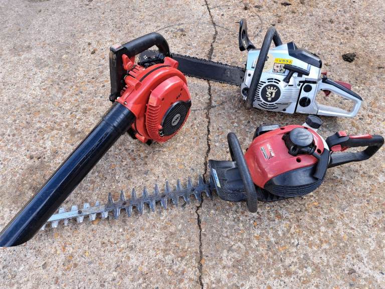 Three petrol garden tools 