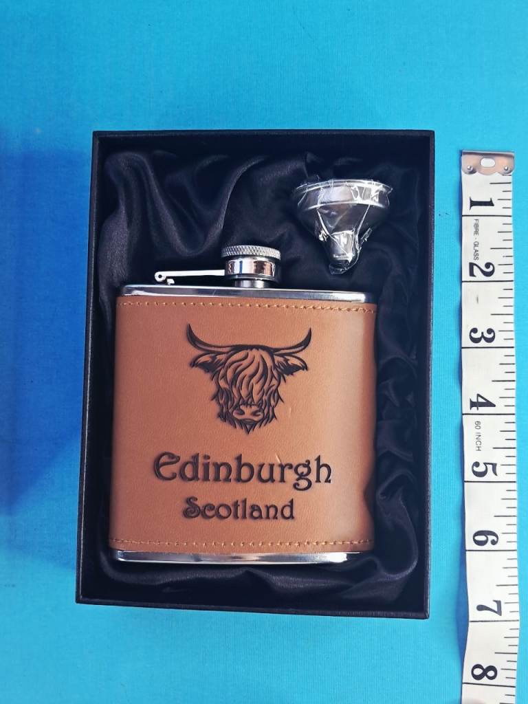 This is a Selbrae House Highland Cow leather hip flask.  As seen. .