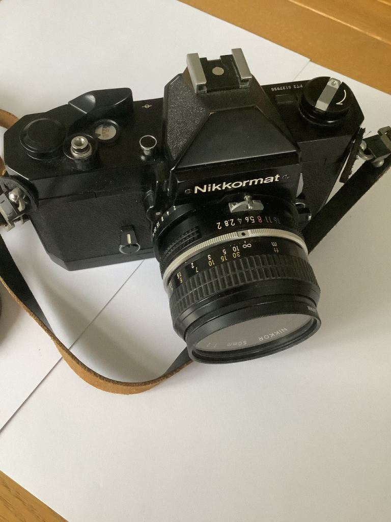 Nikon Nikkormat FT2 Film Camera and Unomat Flashgun and Coloured Filters.