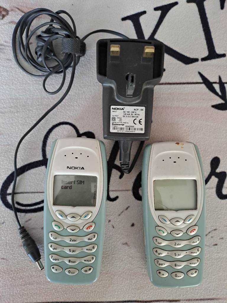 Two Nokia 3310 Mobile Phones with Charger – Good Condition