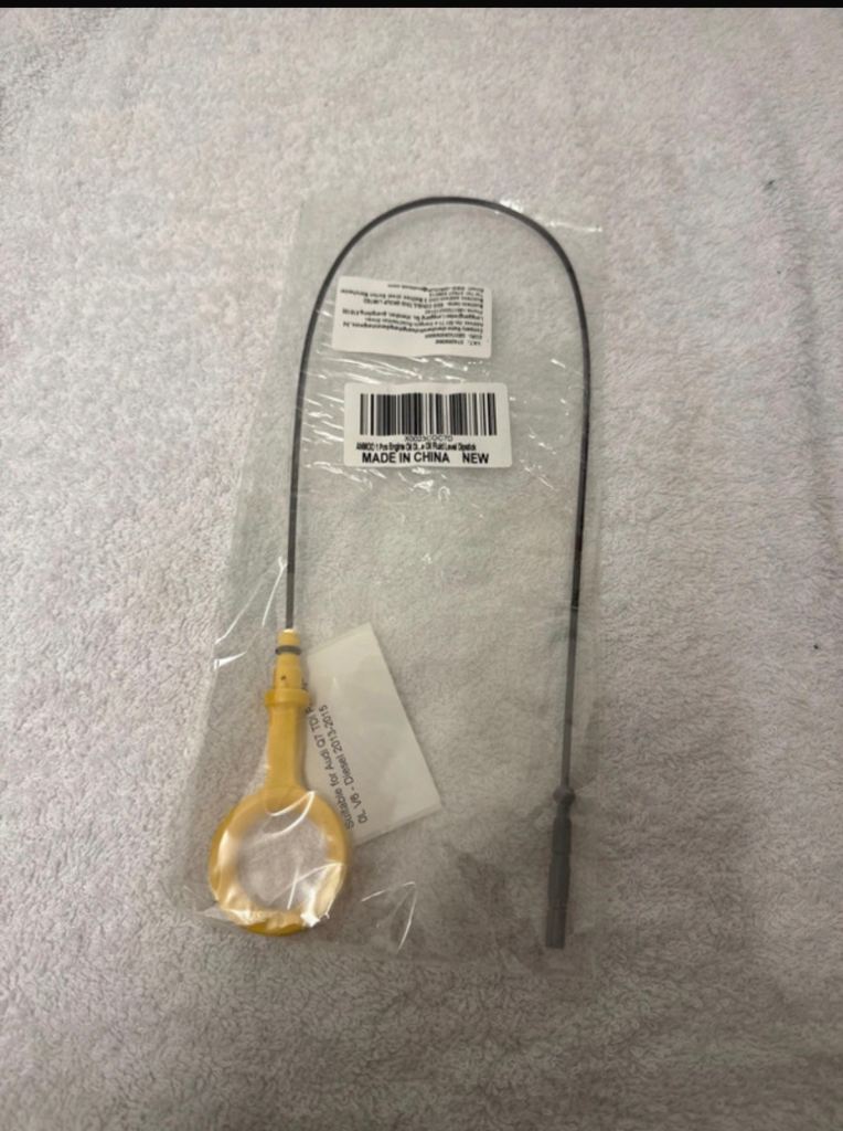 Engine oil level dipstick