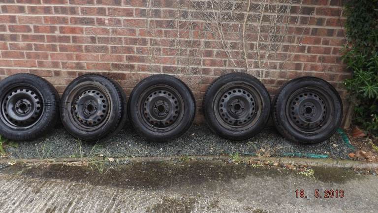 FIVE STEEL WHEELS WITH TYRES
