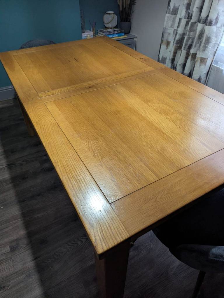Solid wood extendable dining table - used with a few marks , £40.00 for ...