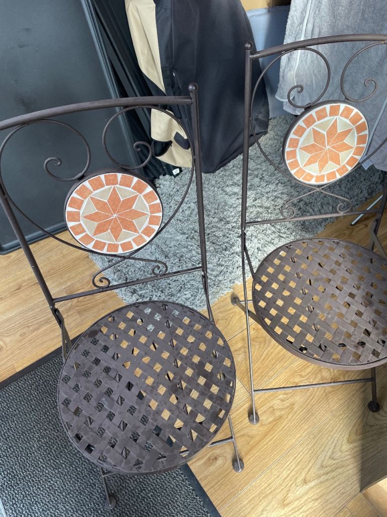 2 bistro chairs. 