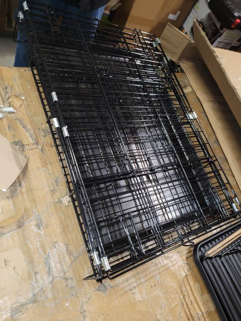 A new dog cage the measurements are 24 inch 