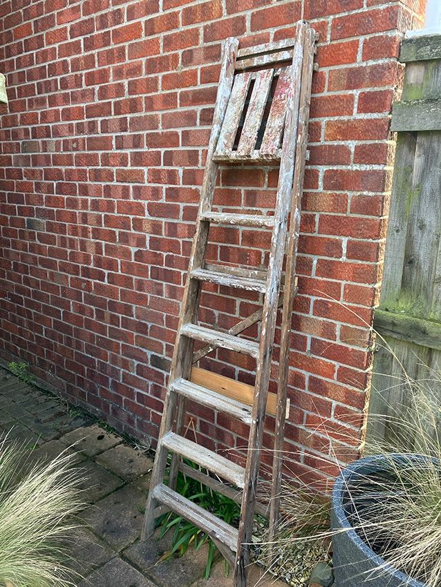 Vintage and well-loved wooden step ladder