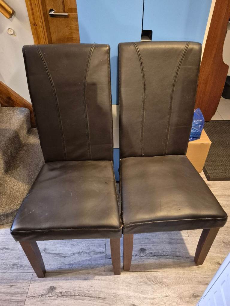 2 brown leather dinning chair