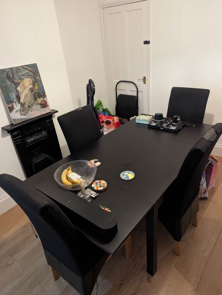 Wooden extendable table and leather chair set with cover