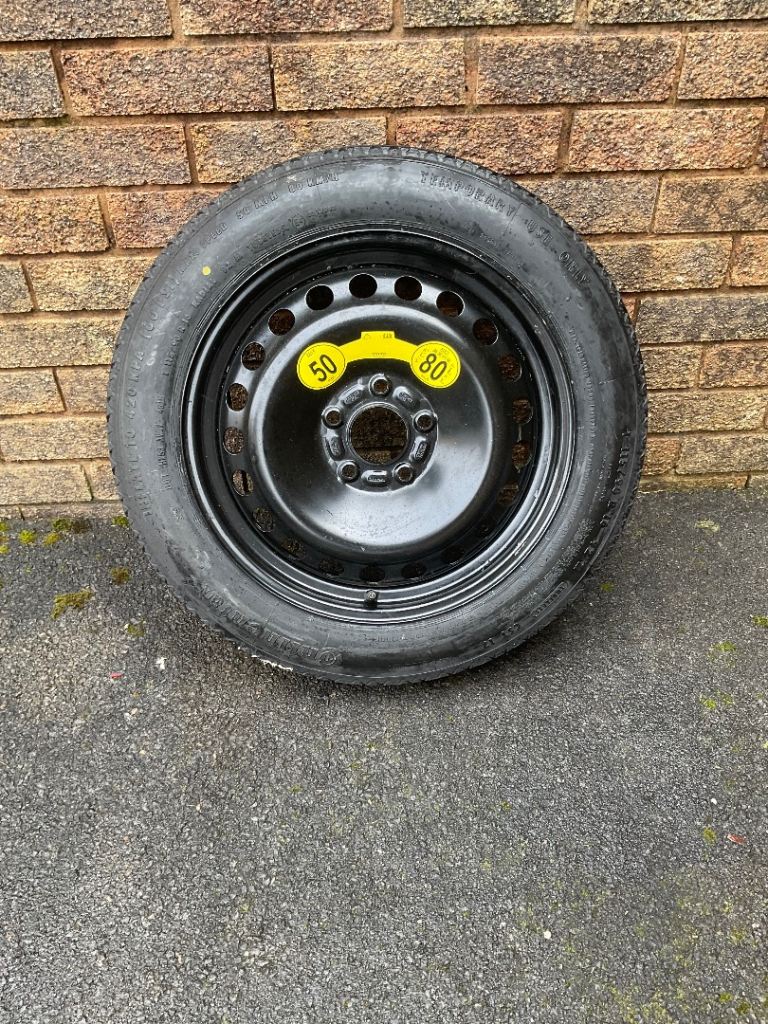 New never been used get you home spare wheel 