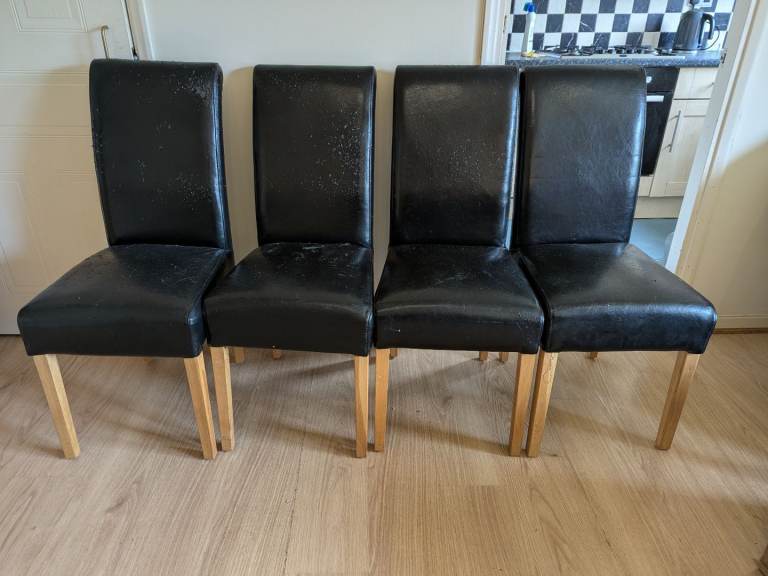 4 black dining chairs