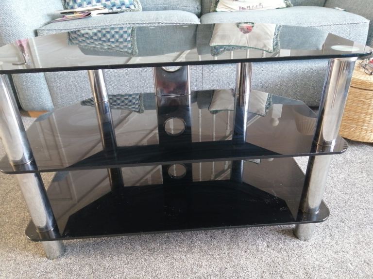 Black Glass TV Stand with Chrome Legs – Good Condition