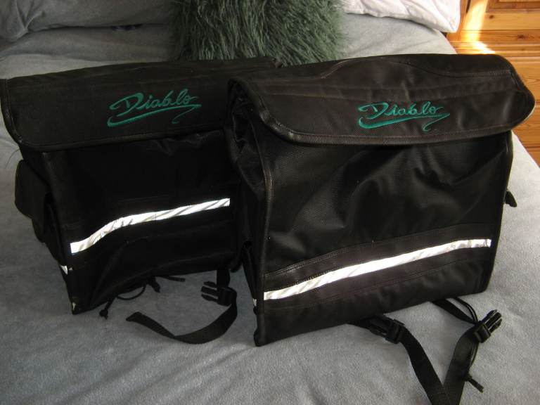 Diablo motorbike pannier bags. Roll down top flaps, side pockets, reflective strips. VGC