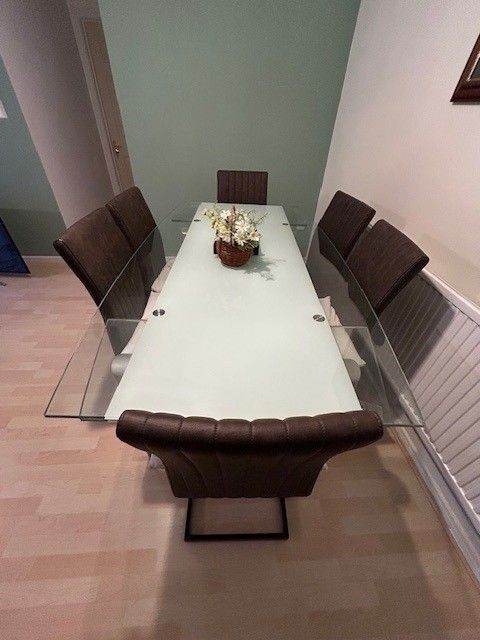 Glass Dining Table with 6 Brown Chairs – Good Condition