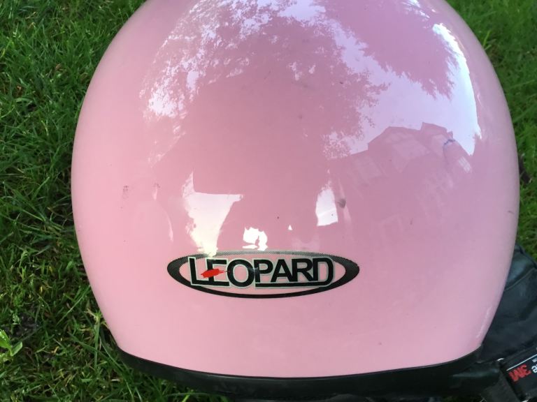 3 motorcycle helmets, a Leopard Vespa open face, Lazer full face, SHOEI full face + leather gloves.