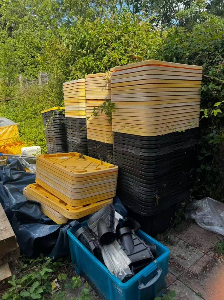 Stackable Yellow and Black Plastic Storage Boxes - Good Condition
