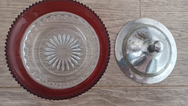 Cranberry rimmed glass dish, with scratched lidand silver tray