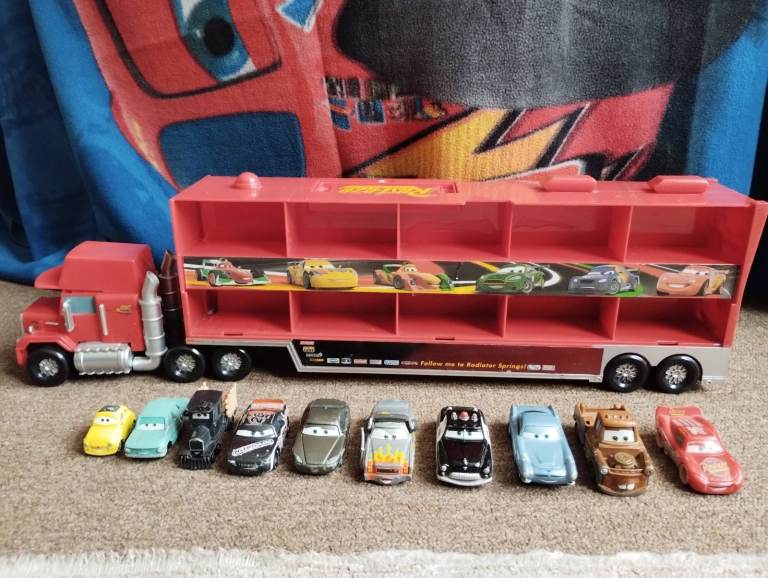 Mattel Disney Cars 3 Rust-eze Mack Hauler Truck with 10 Die Cast Cars Collection