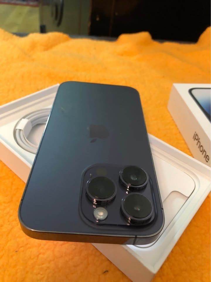 New condition iPhone 14 Pro purple 128gb unlocked in box