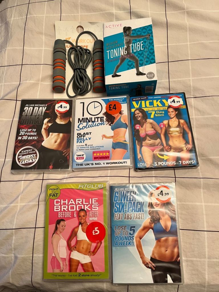 Fitness Bundle: Skipping Rope, Toning Tube, and 5 Workout DVDs