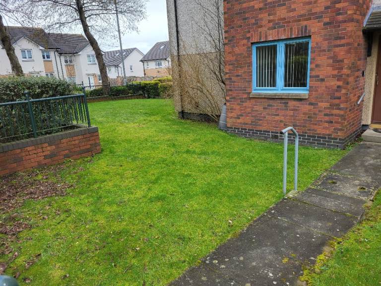 Main door two-bedroom flat with garden on Easthall G33